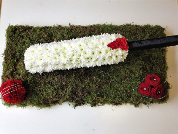Cricket bat themed floral arrangement