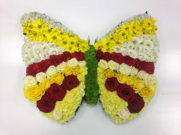 Butterfly arrangement funeral flowers